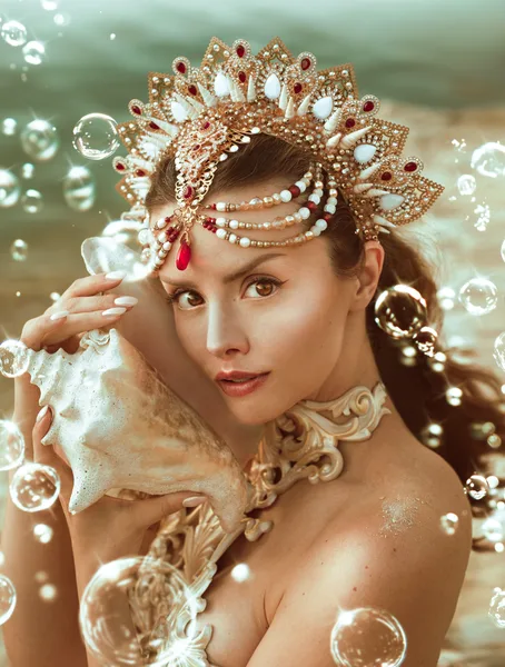 Mermaid portrait with golden crown